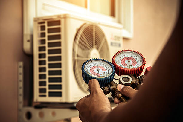 Professional Air Conditioning Service technician working in Mount Auburn, IL